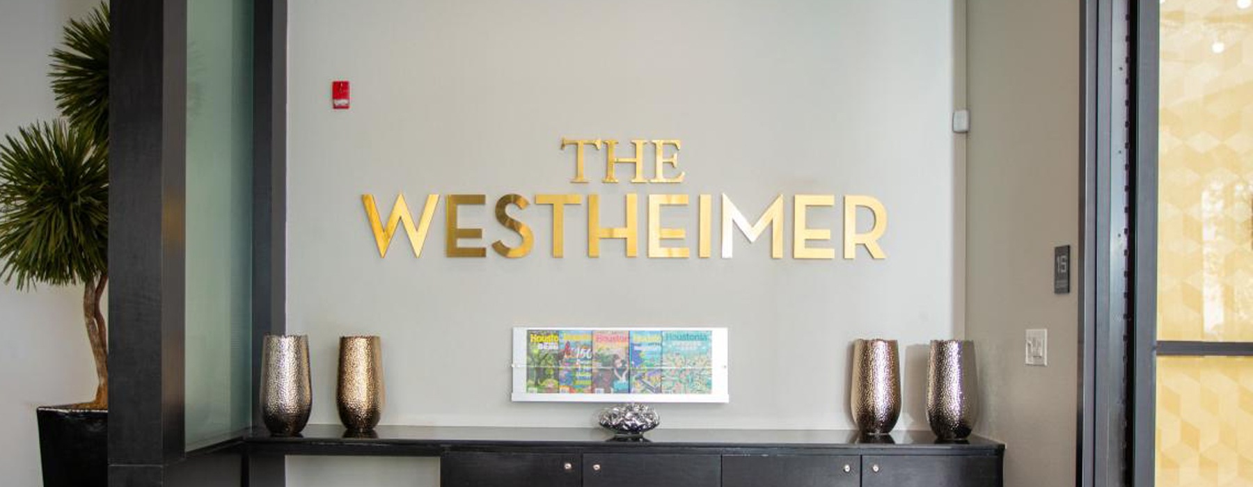 desk with computer and lamp